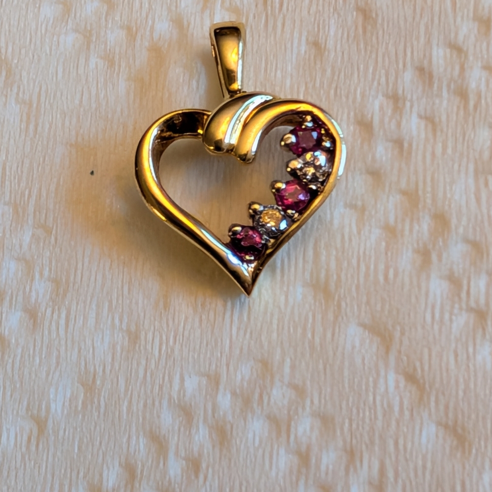14k Gold Heart Necklace with Rubies And Diamonds.